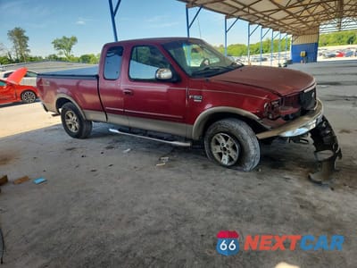 Czwarte zdjęcie samochodu z boku: 2002 FORD F150 VIN:1FTRX18L22NB73368 - miniatura