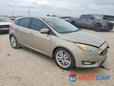 Czwarte zdjęcie samochodu z boku: 2015 FORD FOCUS TITANIUM VIN:1FADP3N21FL268836 - miniatura