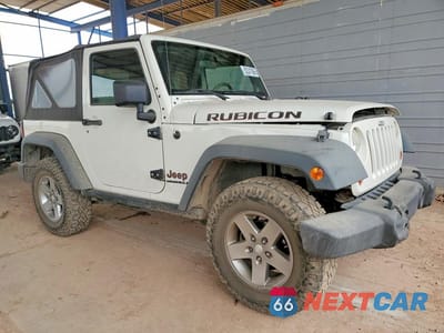 Czwarte zdjęcie samochodu z boku: 2010 JEEP WRANGLER RUBICON VIN:1J4HA6D10AL213966 - miniatura
