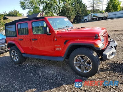 Czwarte zdjęcie samochodu z boku: 2018 JEEP WRANGLER UNLIMITED SAHARA VIN:1C4HJXEN7JW199639 - miniatura