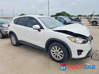 Czwarte zdjęcie samochodu z boku: 2016 MAZDA CX-5 TOURING VIN:JM3KE2CY9G0660711 - miniatura