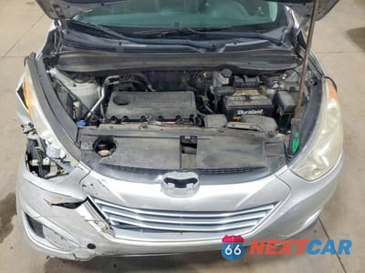 Zdjęcie 12 z 13 samochodu: 2011 HYUNDAI TUCSON GLS VIN:KM8JU3AC5BU160062 - miniatura