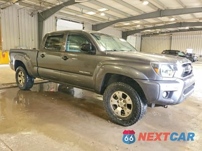 Czwarte zdjęcie samochodu z boku: 2015 TOYOTA TACOMA DOUBLE CAB LONG BED VIN:3TMMU4FN1FM084383 - miniatura