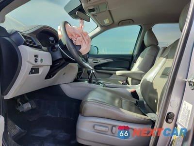 Zdjęcie 7 z 13 samochodu: 2020 HONDA PILOT EX VIN:5FNYF5H39LB027071 - miniatura