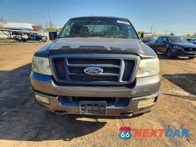 Piąte zdjęcie samochodu w środku: 2004 FORD F150 VIN:1FTPX14554NA60967 - miniatura