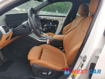 Zdjęcie 7 z 12 samochodu: 2023 BMW 330E VIN:3MW39FF04P8C96988 - miniatura