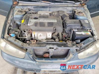 Zdjęcie 11 z 13 samochodu: 2003 HYUNDAI ELANTRA GLS VIN:KMHDN45D33U646664 - miniatura