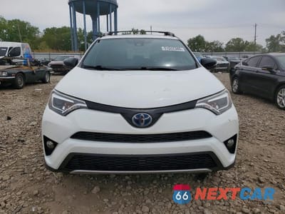 Piąte zdjęcie samochodu w środku: 2017 TOYOTA RAV4 HV SE VIN:JTMJJREV6HD086607 - miniatura
