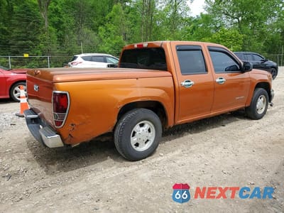 Trzecie zdjęcie samochodu z tyłu: 2004 GMC CANYON VIN:1GTCS138348139979 - miniatura