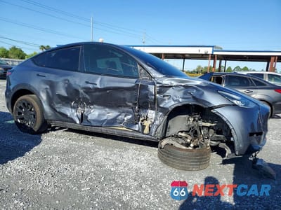 Czwarte zdjęcie samochodu z boku: 2023 TESLA MODEL Y VIN:7SAYGDEE7PA079236 - miniatura