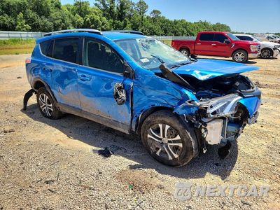 Czwarte zdjęcie samochodu z boku: 2018 TOYOTA RAV4 LE VIN:JTMZFREV1JJ156879 - miniatura
