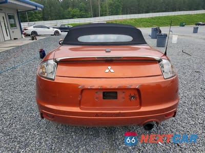 Zdjęcie 6 z 12 samochodu: 2009 MITSUBISHI ECLIPSE SPYDER GS VIN:4A3AL25F19E040086 - miniatura