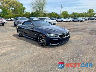 Czwarte zdjęcie samochodu z boku: 2019 BMW M850XI VIN:WBAFY4C50KBX38841 - miniatura