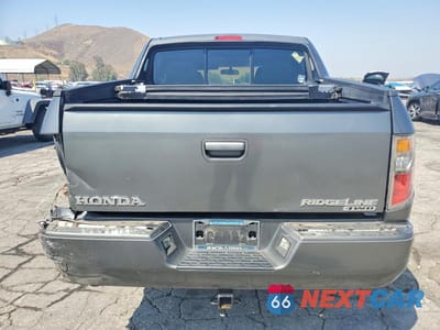 Zdjęcie 6 z 12 samochodu: 2007 HONDA RIDGELINE RTS VIN:2HJYK16467H513624 - miniatura
