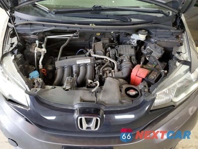 Zdjęcie 11 z 12 samochodu: 2016 HONDA FIT LX VIN:JHMGK5H52GX041039 - miniatura