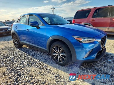 Czwarte zdjęcie samochodu z boku: 2017 MAZDA CX-3 TOURING VIN:JM1DKFC70H0176310 - miniatura