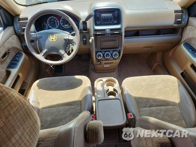 Zdjęcie 8 z 13 samochodu: 2004 HONDA CR-V LX VIN:SHSRD78464U209755 - miniatura