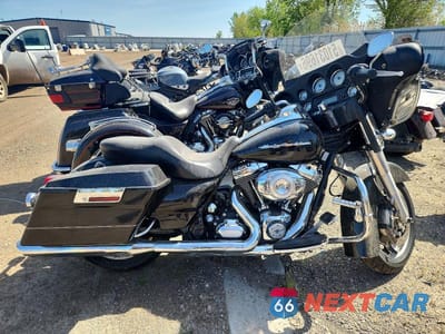 2011 HARLEY DAVIDSON FLHX 1HD1KBM10BB675561 - główne zdjęcie licytacji z USA - miniatura