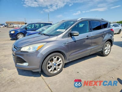 2014 FORD ESCAPE TITANIUM 1FMCU0JX2EUB44576 - główne zdjęcie licytacji z USA - miniatura
