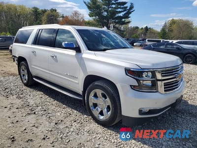 Czwarte zdjęcie samochodu z boku: 2017 CHEVROLET SUBURBAN K1500 PREMIER VIN:1GNSKJKC1HR292577 - miniatura