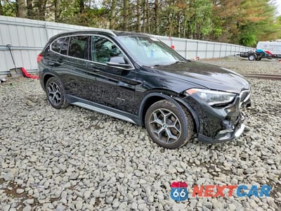 Czwarte zdjęcie samochodu z boku: 2017 BMW X1 XDRIVE28I VIN:WBXHT3C38H5F72150 - miniatura