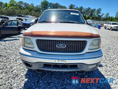 Piąte zdjęcie samochodu w środku: 2000 FORD F-150 VIN:2FTRX18L2YCB02783 - miniatura