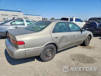 Trzecie zdjęcie samochodu z tyłu: 1999 TOYOTA CAMRY CE VIN:4T1BG22K9XU579647 - miniatura