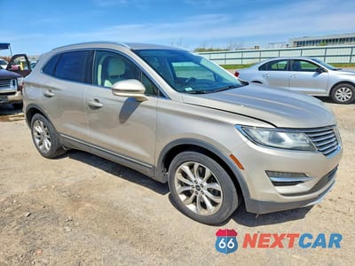 Czwarte zdjęcie samochodu z boku: 2015 LINCOLN MKC VIN:5LMCJ1A9XFUJ10142 - miniatura