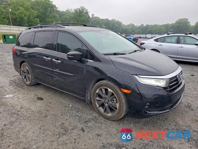 Czwarte zdjęcie samochodu z boku: 2023 HONDA ODYSSEY ELITE VIN:5FNRL6H95PB050943 - miniatura