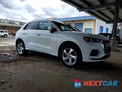 Czwarte zdjęcie samochodu z boku: 2019 AUDI Q3 PREMIUM VIN:WA1AECF32K1078991 - miniatura