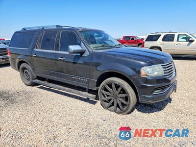 Czwarte zdjęcie samochodu z boku: 2015 LINCOLN NAVIGATOR L VIN:5LMJJ3JT5FEJ00580 - miniatura