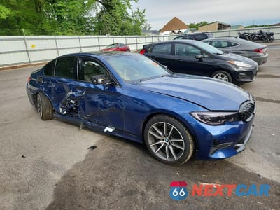 Czwarte zdjęcie samochodu z boku: 2021 BMW 330XI VIN:3MW5R7J06M8B84887 - miniatura