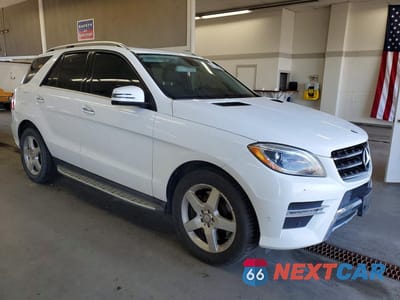 Czwarte zdjęcie samochodu z boku: 2014 MERCEDES-BENZ ML 550 4MATIC VIN:4JGDA7DB4EA335990 - miniatura