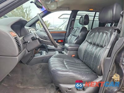 Zdjęcie 7 z 13 samochodu: 1999 JEEP GRAND CHEROKEE LIMITED VIN:1J4G268S3XC537241 - miniatura