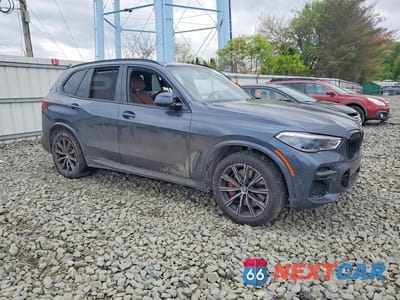 Czwarte zdjęcie samochodu z boku: 2022 BMW X5 M50I VIN:5UXJU4C05N9J68584 - miniatura