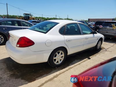 Trzecie zdjęcie samochodu z tyłu: 2000 FORD TAURUS SES VIN:1FAFP5528YG140741 - miniatura