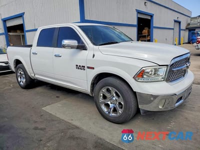 Czwarte zdjęcie samochodu z boku: 2015 RAM 1500 LARAMIE VIN:1C6RR6NM4FS590056 - miniatura