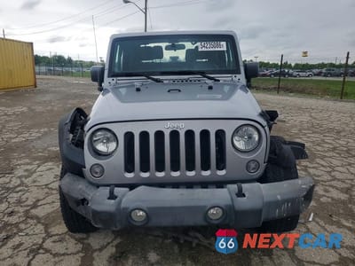 Piąte zdjęcie samochodu w środku: 2016 JEEP WRANGLER SPORT VIN:1C4AJWAGXGL257496 - miniatura