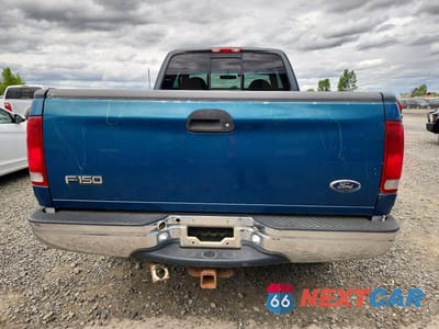 Zdjęcie 6 z 12 samochodu: 2000 FORD F150 VIN:1FTRX18L4YNA41396 - miniatura