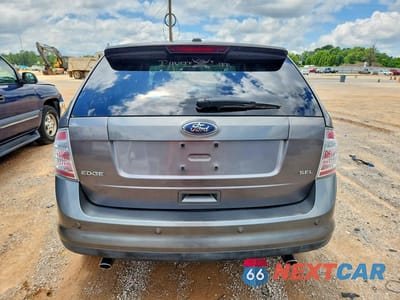 Zdjęcie 6 z 14 samochodu: 2010 FORD EDGE SEL VIN:2FMDK3JC9ABA11550 - miniatura