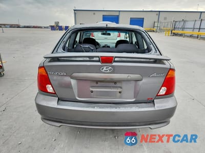 Zdjęcie 6 z 12 samochodu: 2005 HYUNDAI ACCENT GS VIN:KMHCG35C75U322188 - miniatura