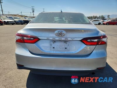 Zdjęcie 6 z 12 samochodu: 2022 TOYOTA CAMRY LE VIN:4T1C11AK6NU642606 - miniatura