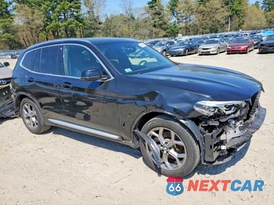 Czwarte zdjęcie samochodu z boku: 2021 BMW X3 XDRIVE30E VIN:5UXTS1C06M9D79811 - miniatura