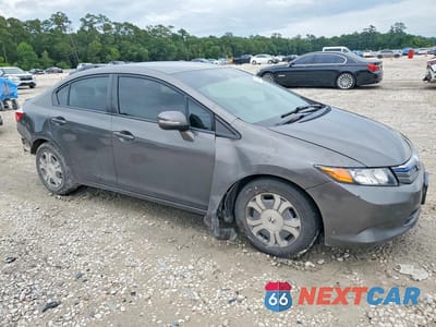Czwarte zdjęcie samochodu z boku: 2012 HONDA CIVIC HYBRID L VIN:JHMFB4F3XCS009261 - miniatura