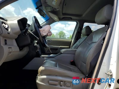 Zdjęcie 7 z 14 samochodu: 2013 HONDA PILOT EXL VIN:5FNYF4H5XDB031823 - miniatura