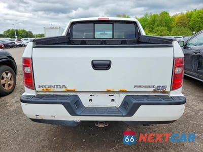 Zdjęcie 6 z 13 samochodu: 2009 HONDA RIDGELINE RT VIN:5FPYK16219B102621 - miniatura