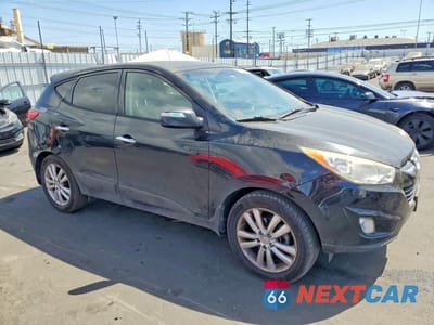 Czwarte zdjęcie samochodu z boku: 2012 HYUNDAI TUCSON LIMITED VIN:KM8JUCAC3CU510239 - miniatura
