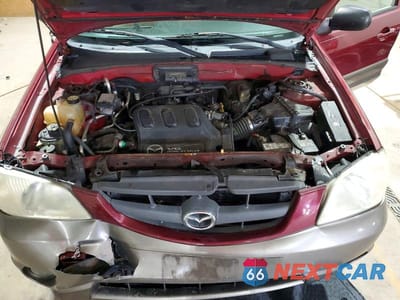 Zdjęcie 12 z 13 samochodu: 2004 MAZDA TRIBUTE ES VIN:4F2CZ06104KM30396 - miniatura