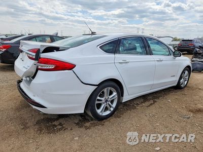 Trzecie zdjęcie samochodu z tyłu: 2018 FORD FUSION SE HYBRID VIN:3FA6P0LU1JR172081 - miniatura