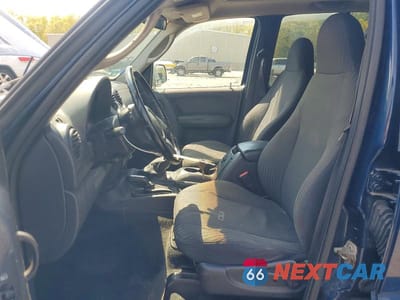 Zdjęcie 7 z 13 samochodu: 2002 JEEP LIBERTY SPORT VIN:1J4GL48K52W326342 - miniatura
